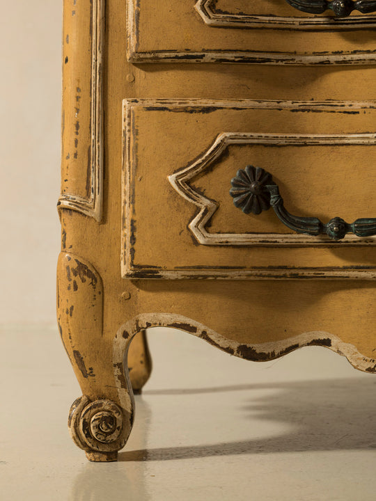 Chest of drawers from the 1920s with yellow and marbled patina
