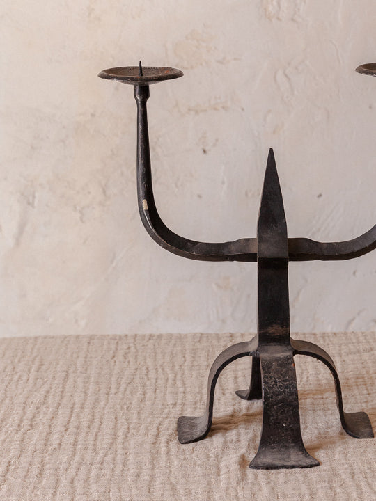 Pair of wrought iron candlesticks from the 50s