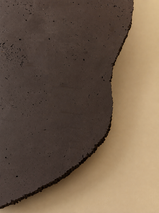 Mesa orgánica travertino negro Ø130cm