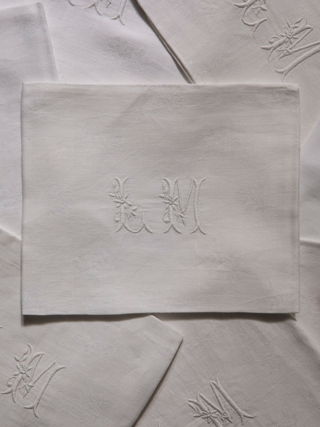 Juego de 8 servilletas de Damasco "LM"
