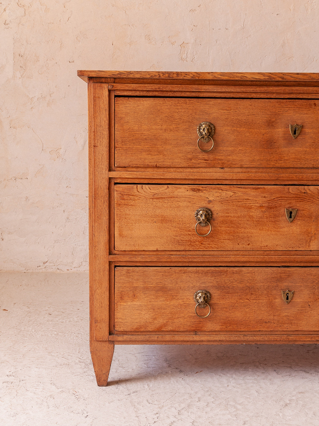 Chest of drawers Directoire chestnut lions XIX