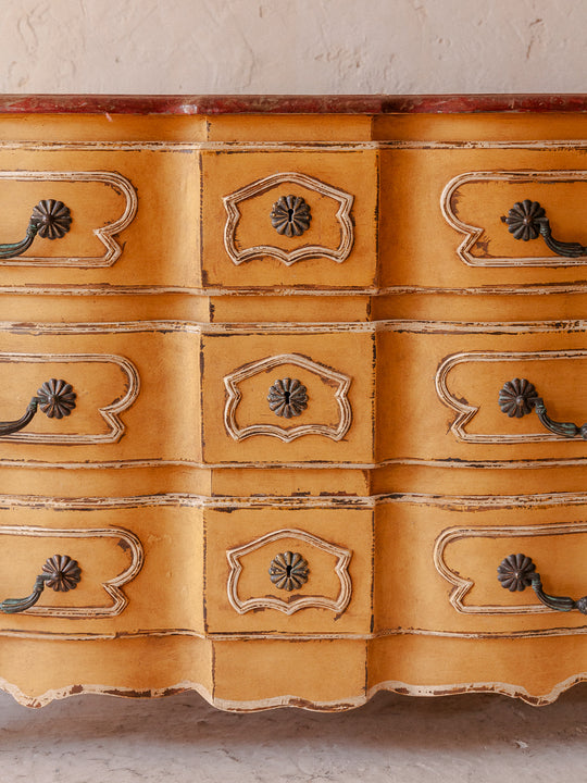 Chest of drawers from the 1920s with yellow and marbled patina