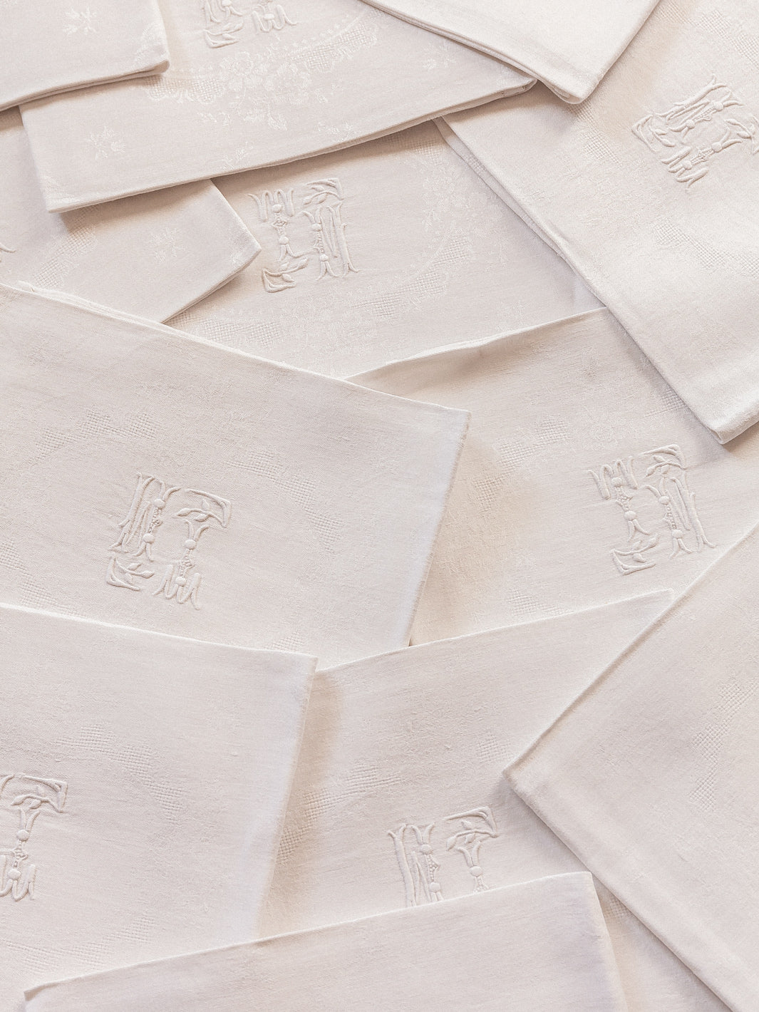 Set of 12 white damask napkins "TM"