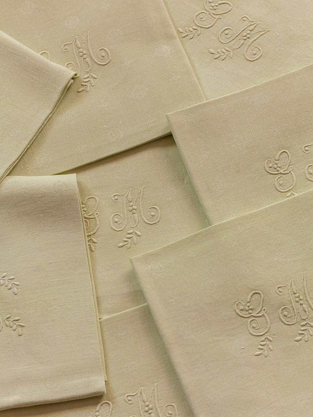 Set of 8 damask lime "GM" napkins