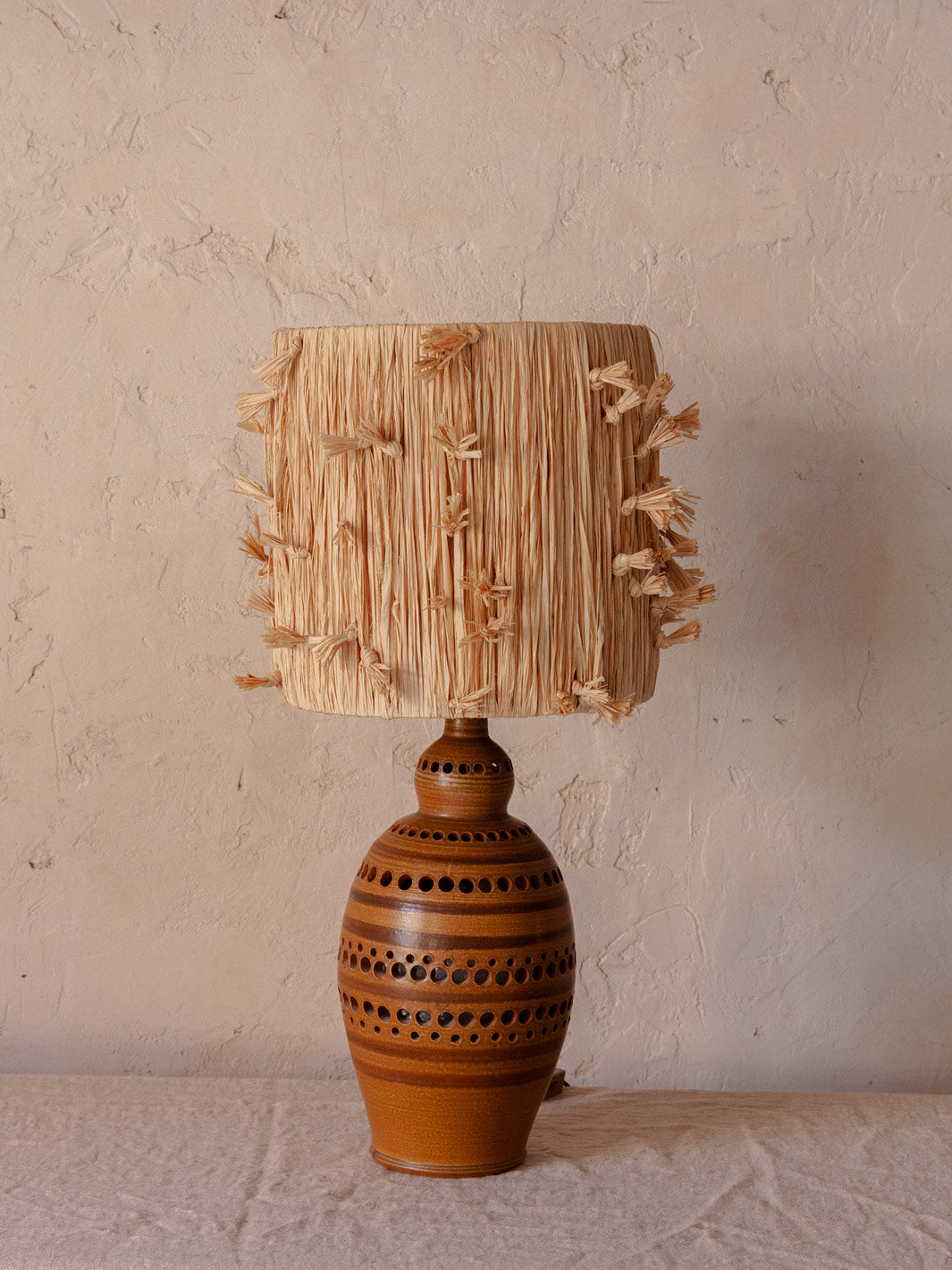 Ceramic lamp and knotted raffia lampshade from the 70s