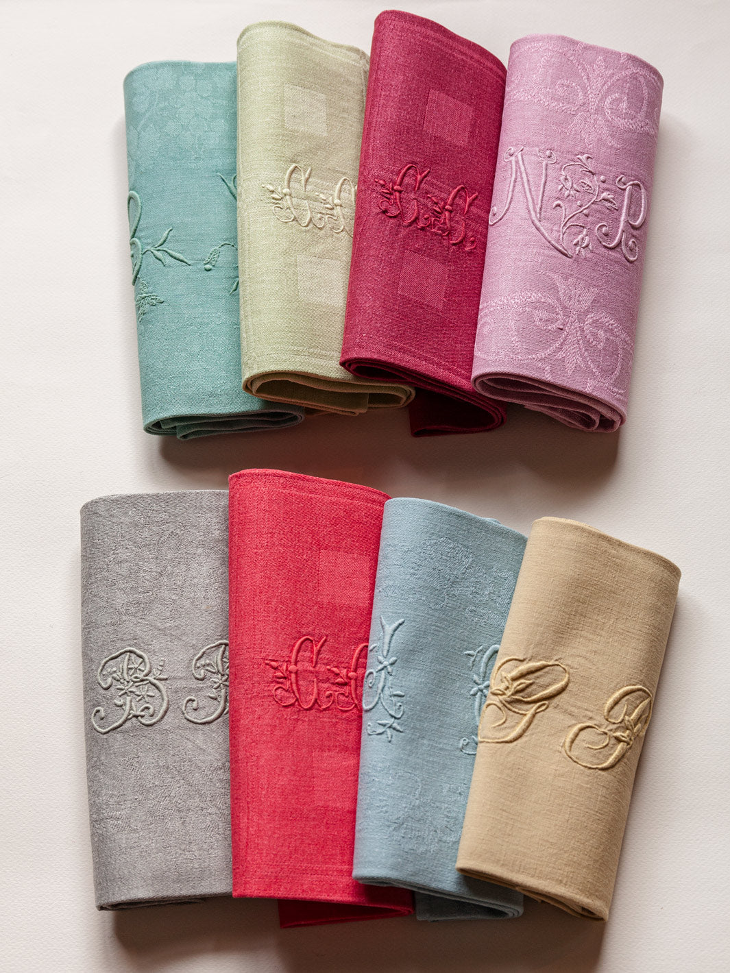Lot de 8 serviettes damassées multicolores