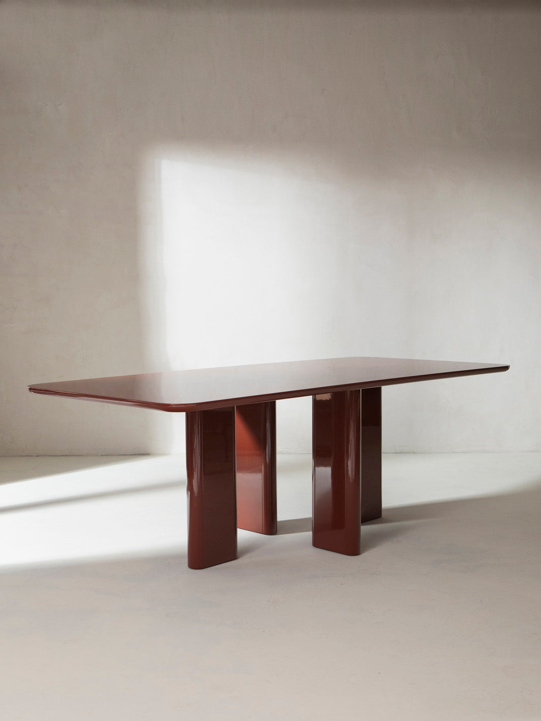 Burgundy lacquered dining table