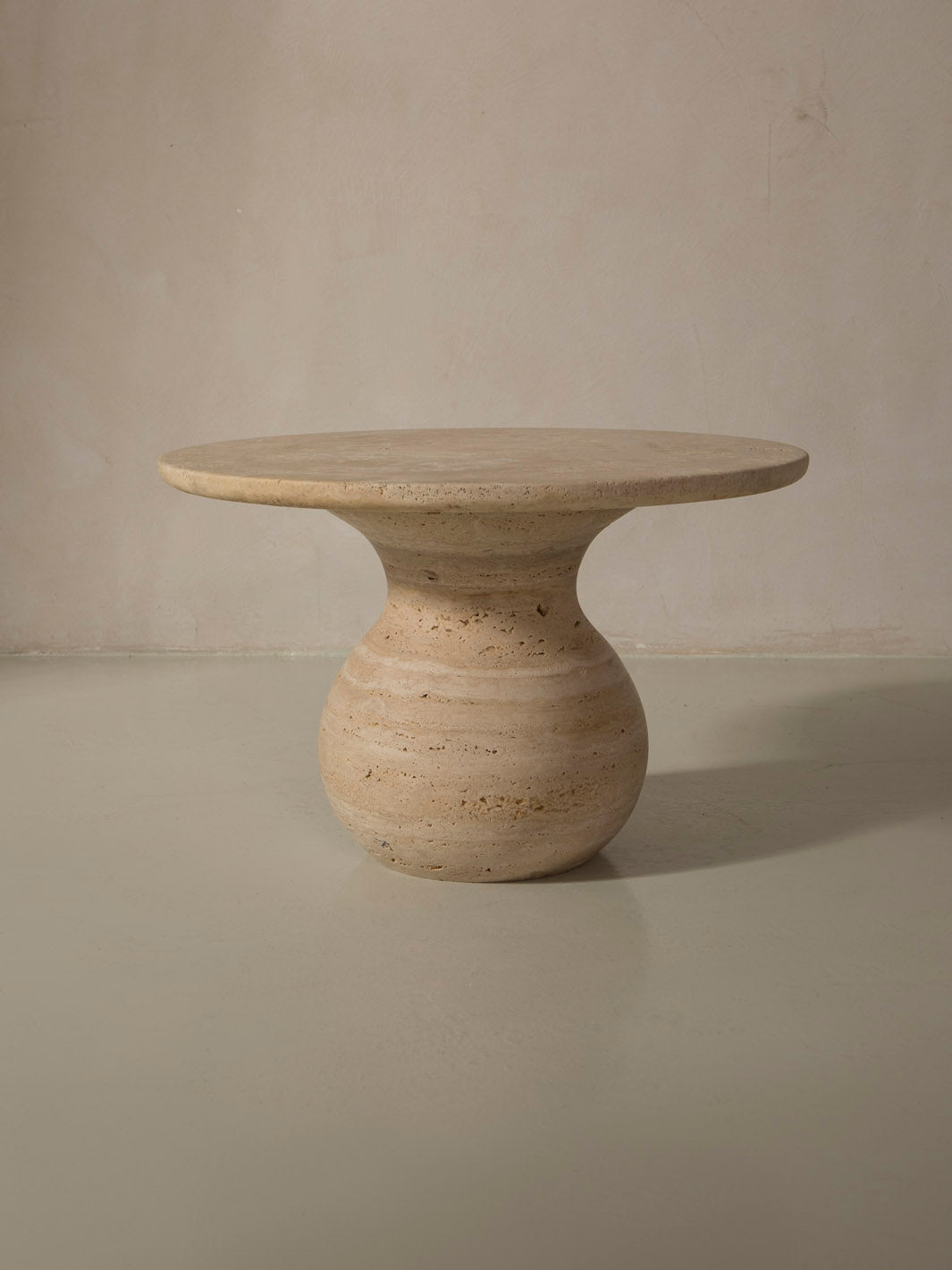 Baby Italia travertine side table