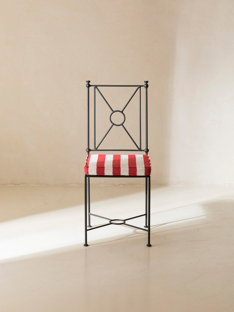 Red and white striped iron chair