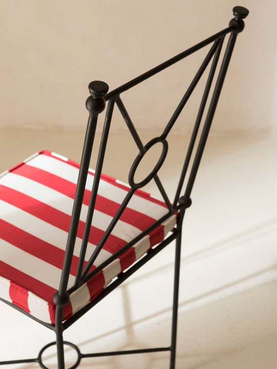 Red and white striped iron chair