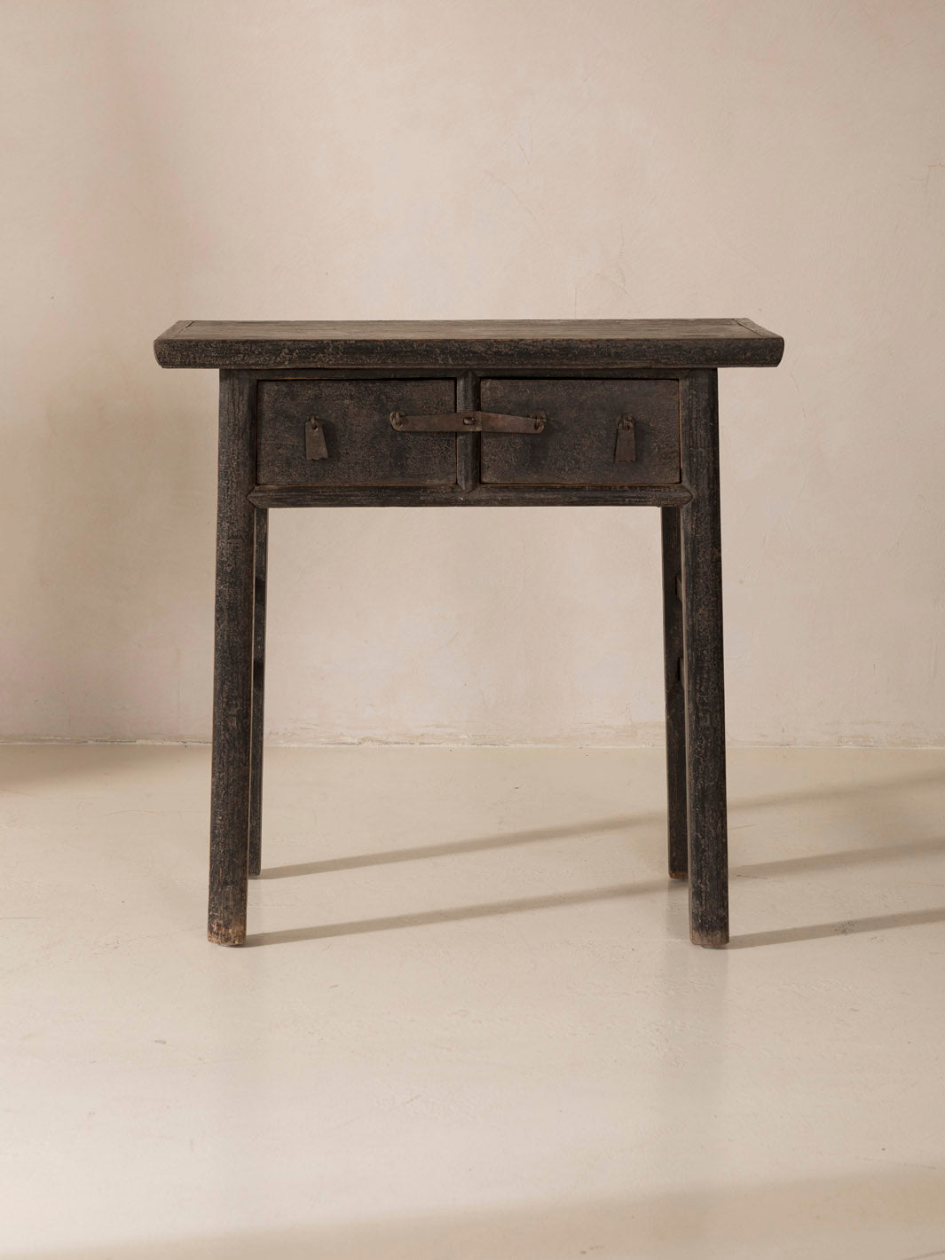 Black lacquered side table
