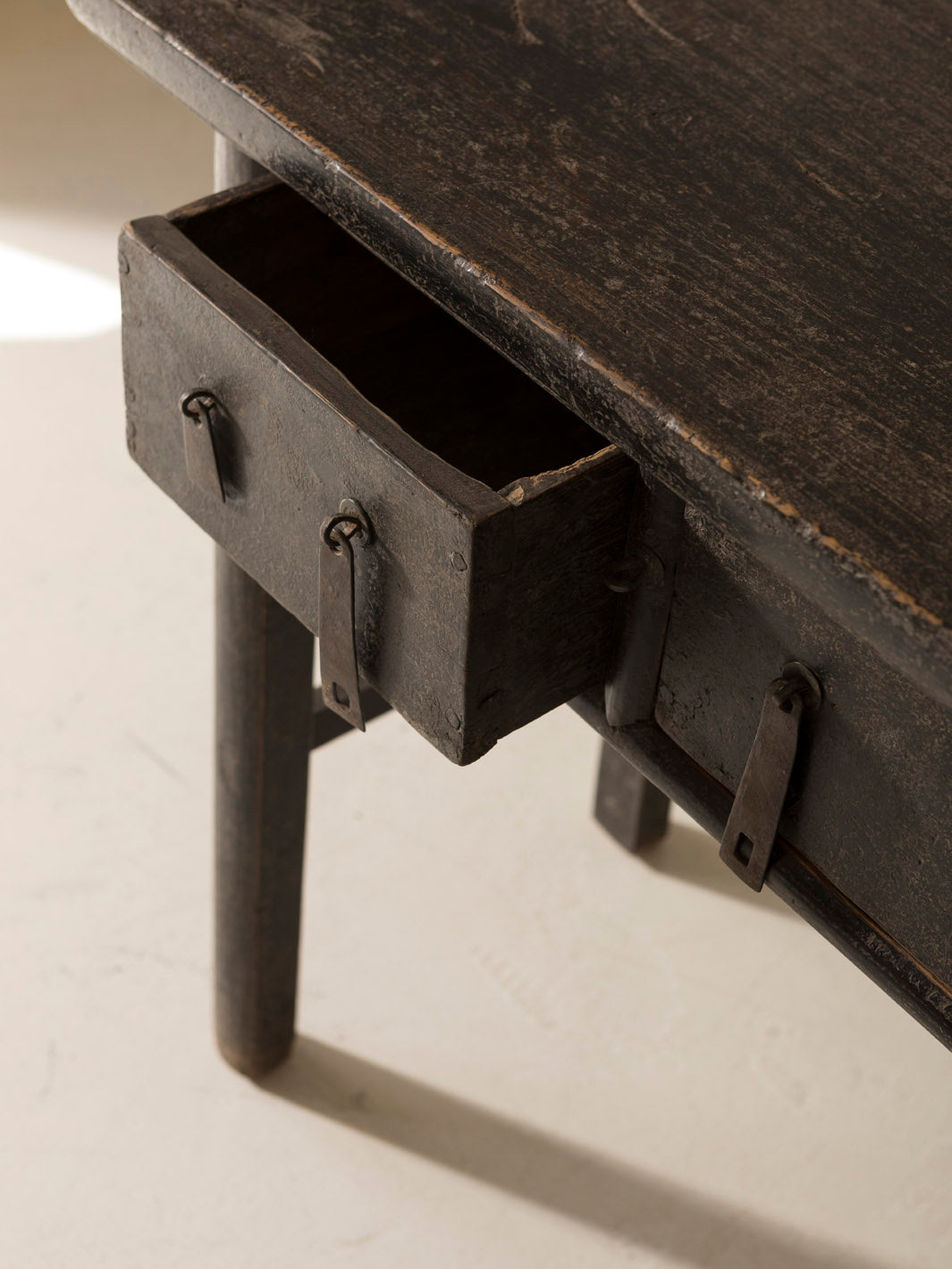 Black lacquered side table