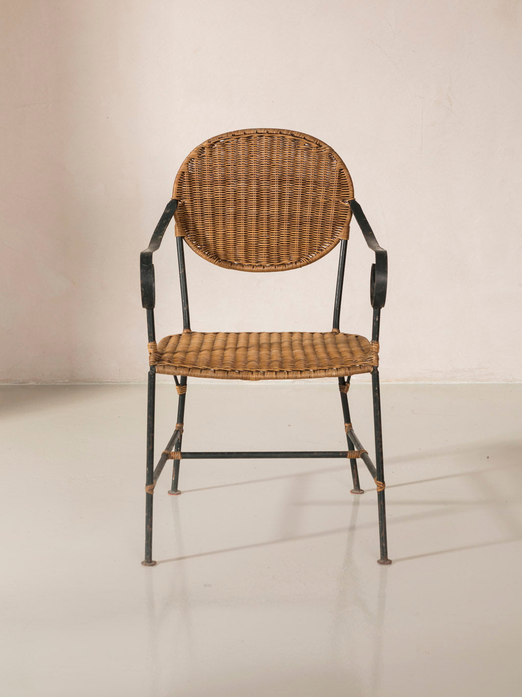 Set of 4 rattan and iron chairs from the 1950s