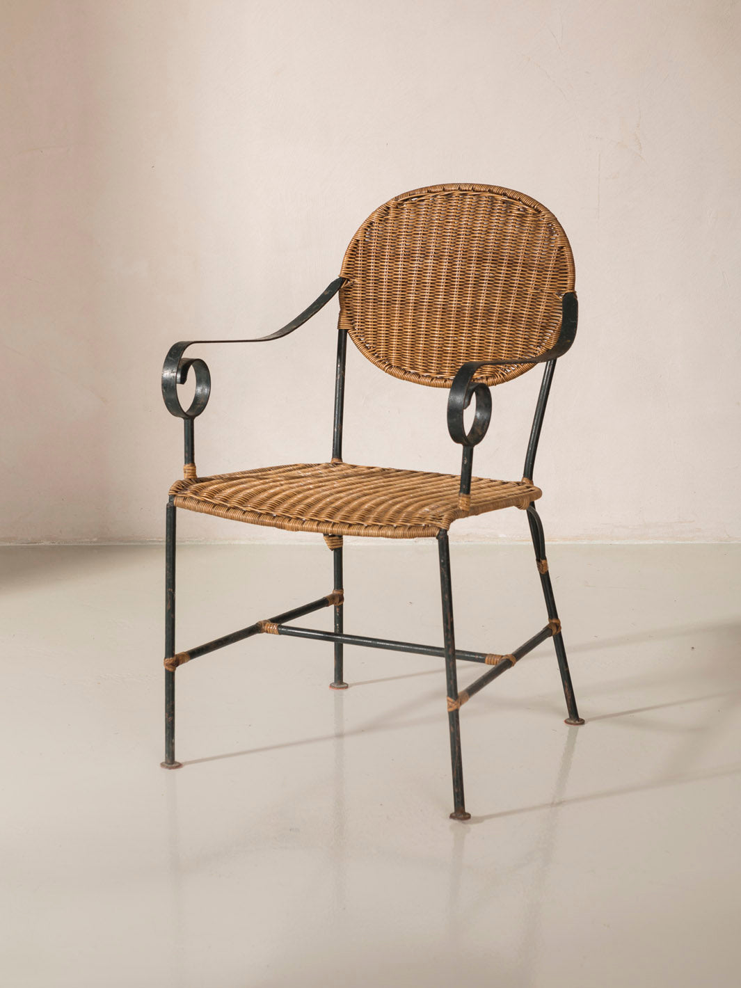 Set of 4 rattan and iron chairs from the 1950s