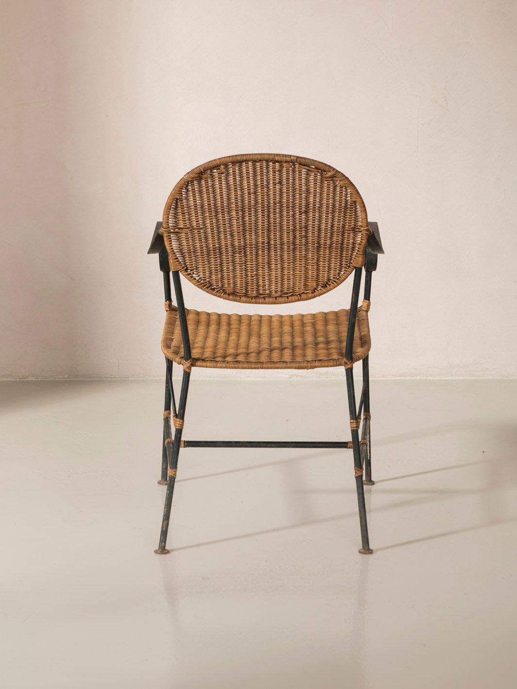 Set of 4 rattan and iron chairs from the 1950s