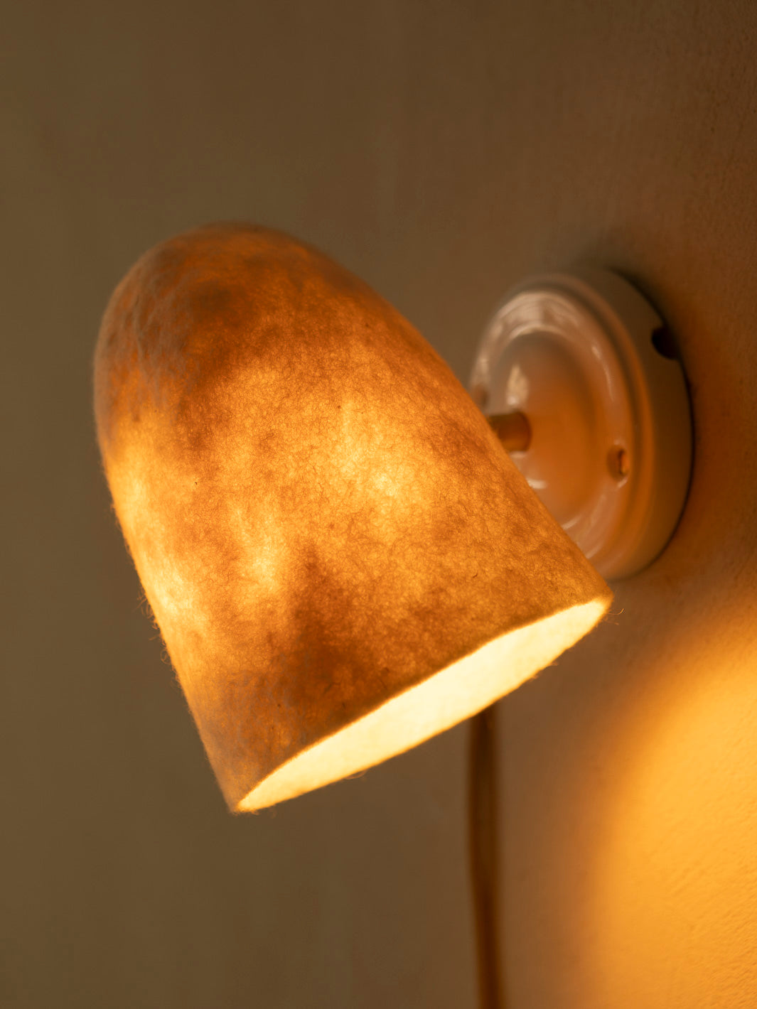 Felt lampshade wall sconce with stoneware basin