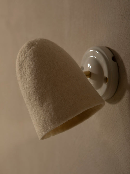 Felt lampshade wall light with adjustable light