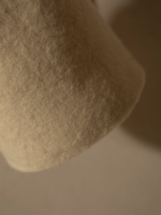 Felt lampshade wall light with adjustable light