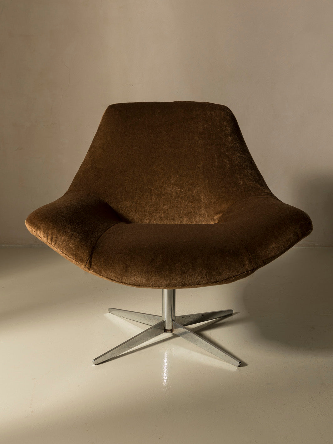 Pair of 60s chrome swivel armchairs