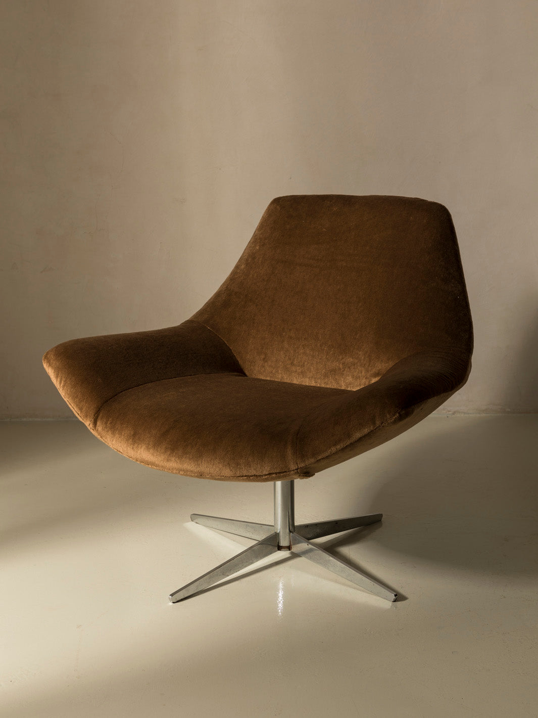 Pair of 60s chrome swivel armchairs