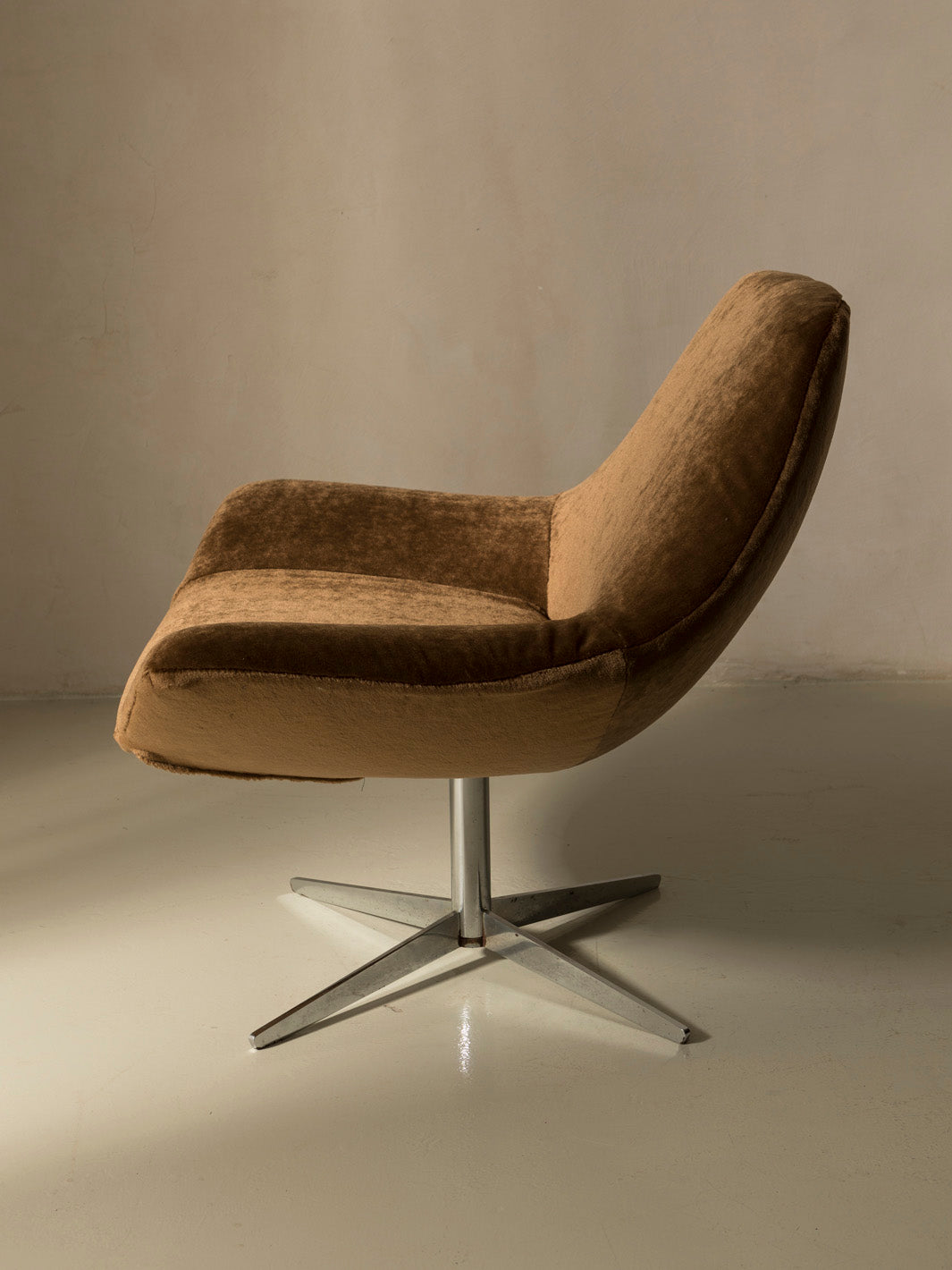 Pair of 60s chrome swivel armchairs