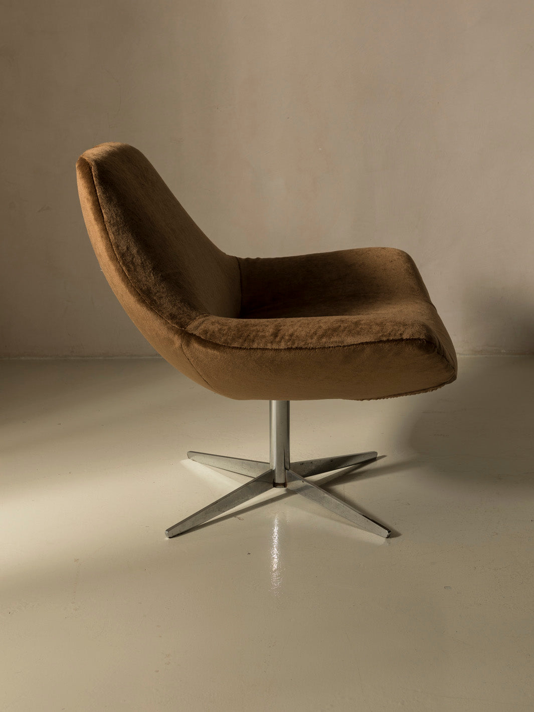 Pair of 60s chrome swivel armchairs