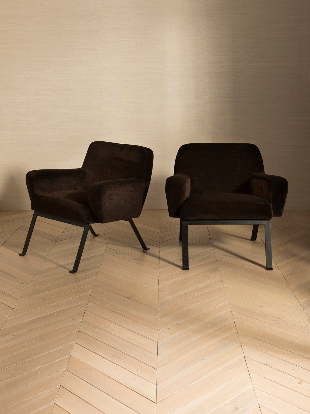 Italian armchairs from the 70s with neo-iron legs