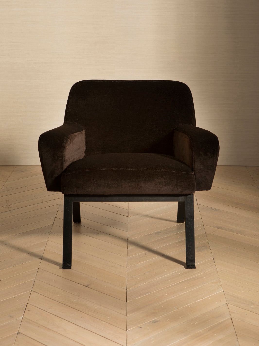 Italian armchairs from the 70s with neo-iron legs