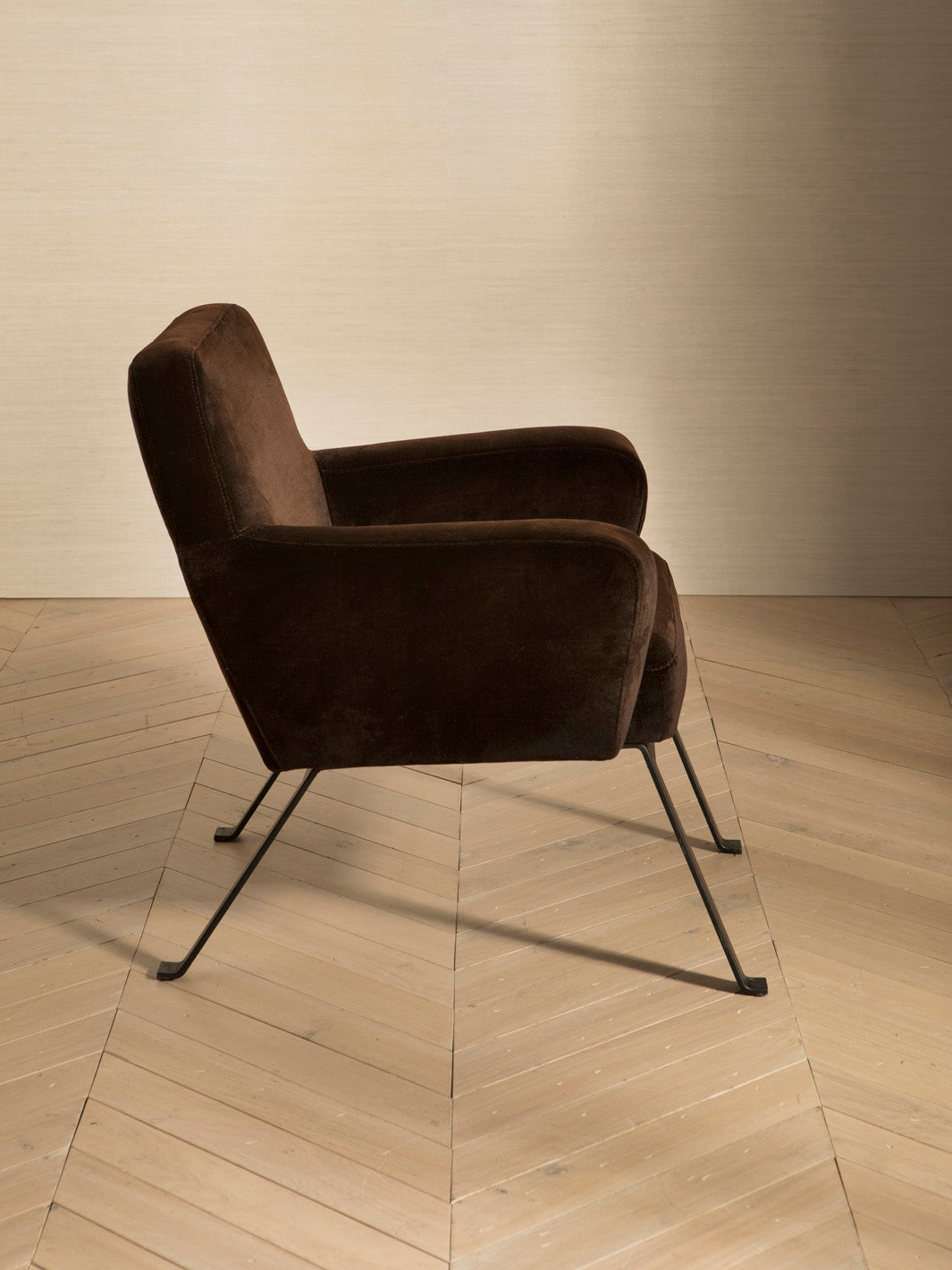 Italian armchairs from the 70s with neo-iron legs