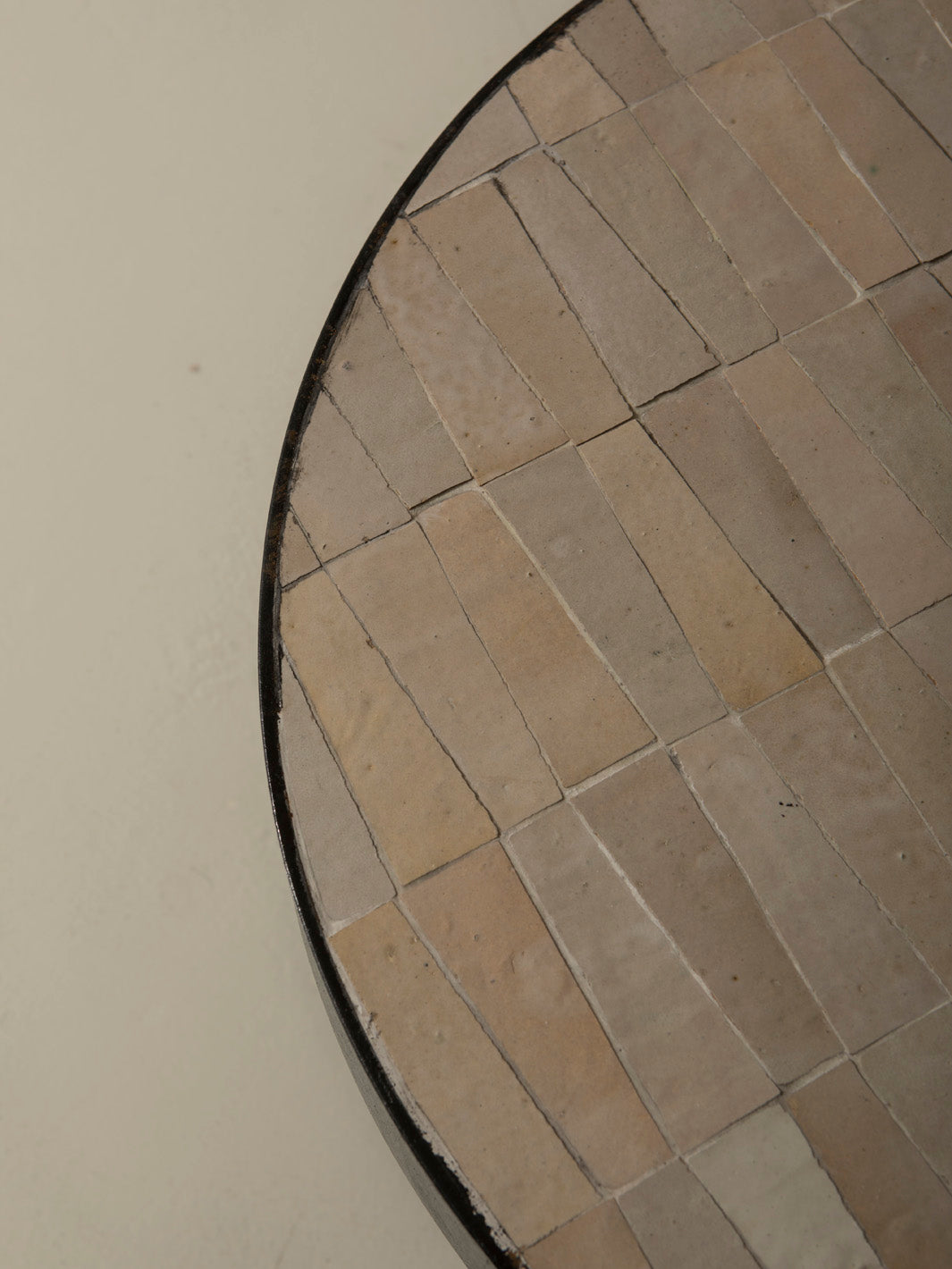 Zellige and iron beige round coffee table