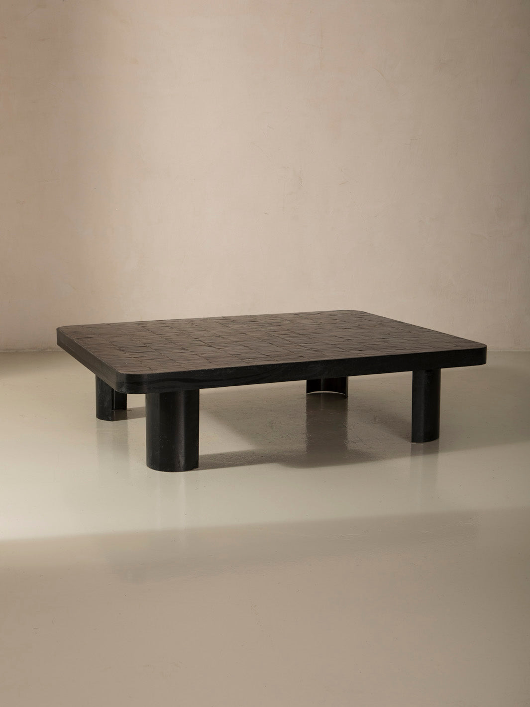 Zellige and iron brown curved low table