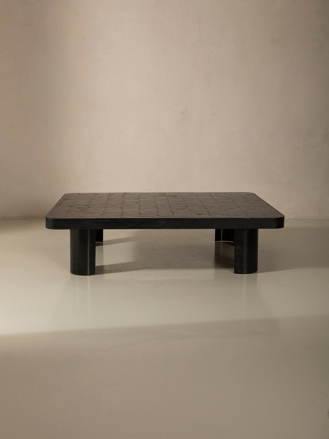 Zellige and iron brown curved low table