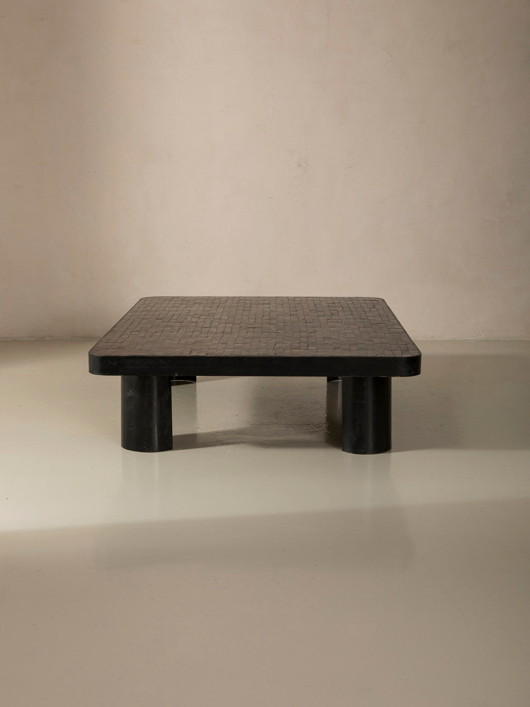 Zellige and iron brown curved low table