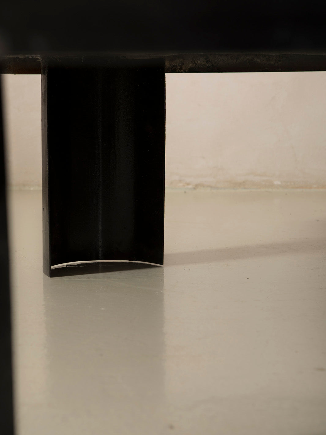 Zellige and iron brown curved low table