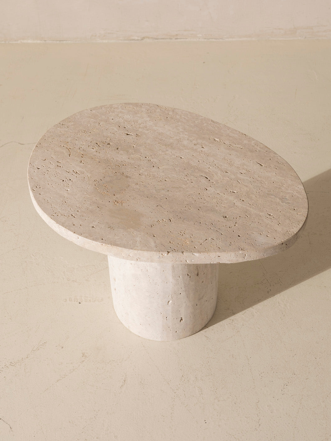 Organic travertine marble table Galet 40H