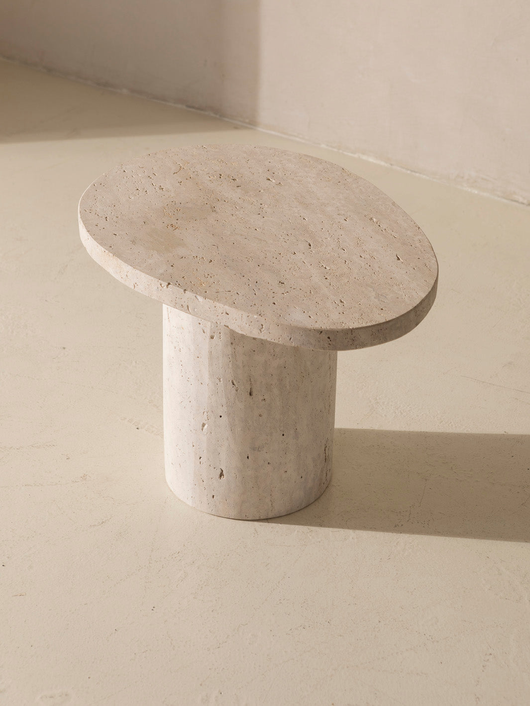 Organic travertine marble table Galet 40H