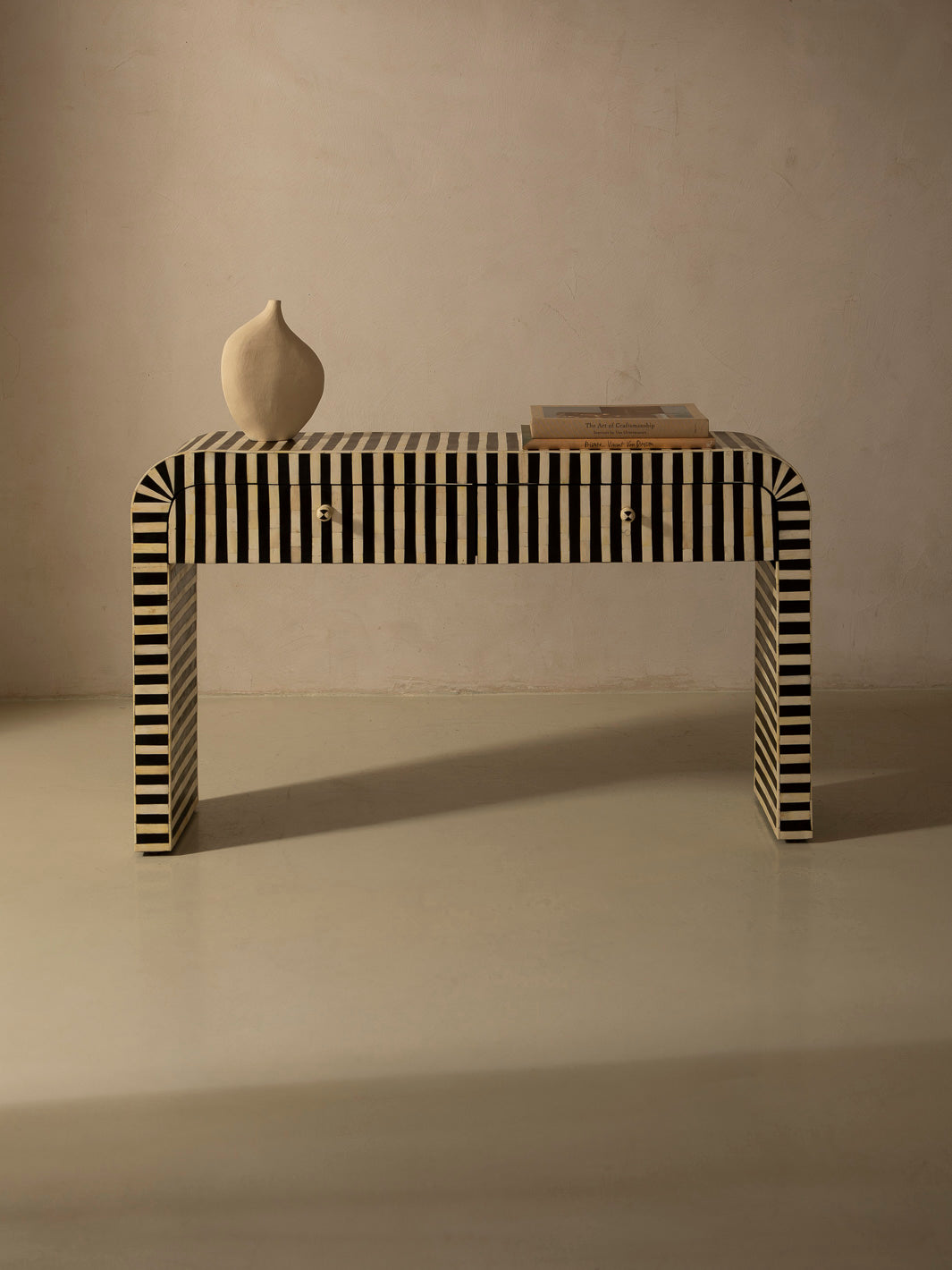 Oval marquetry console table with Africa drawers