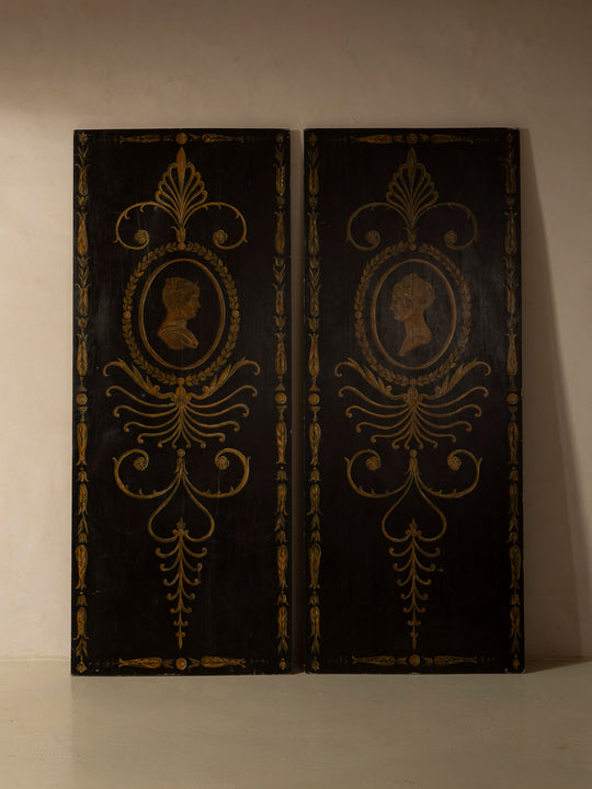 Pair of Florentine panels on a dark background
