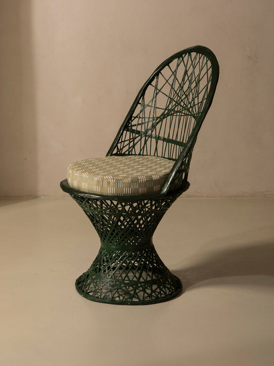 Dark green fiberglass dining chair