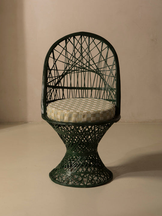 Dark green fiberglass dining chair