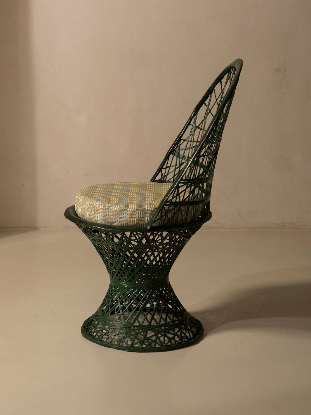 Dark green fiberglass dining chair