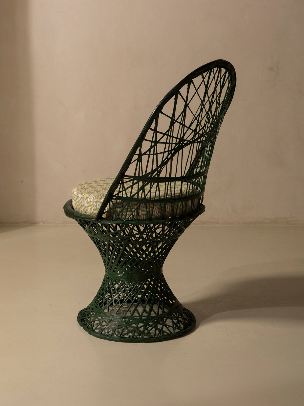 Dark green fiberglass dining chair