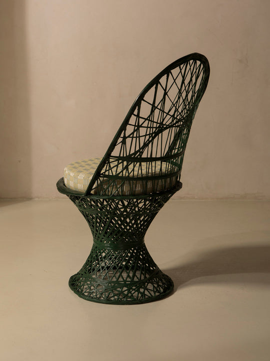 Dark green fiberglass dining chair