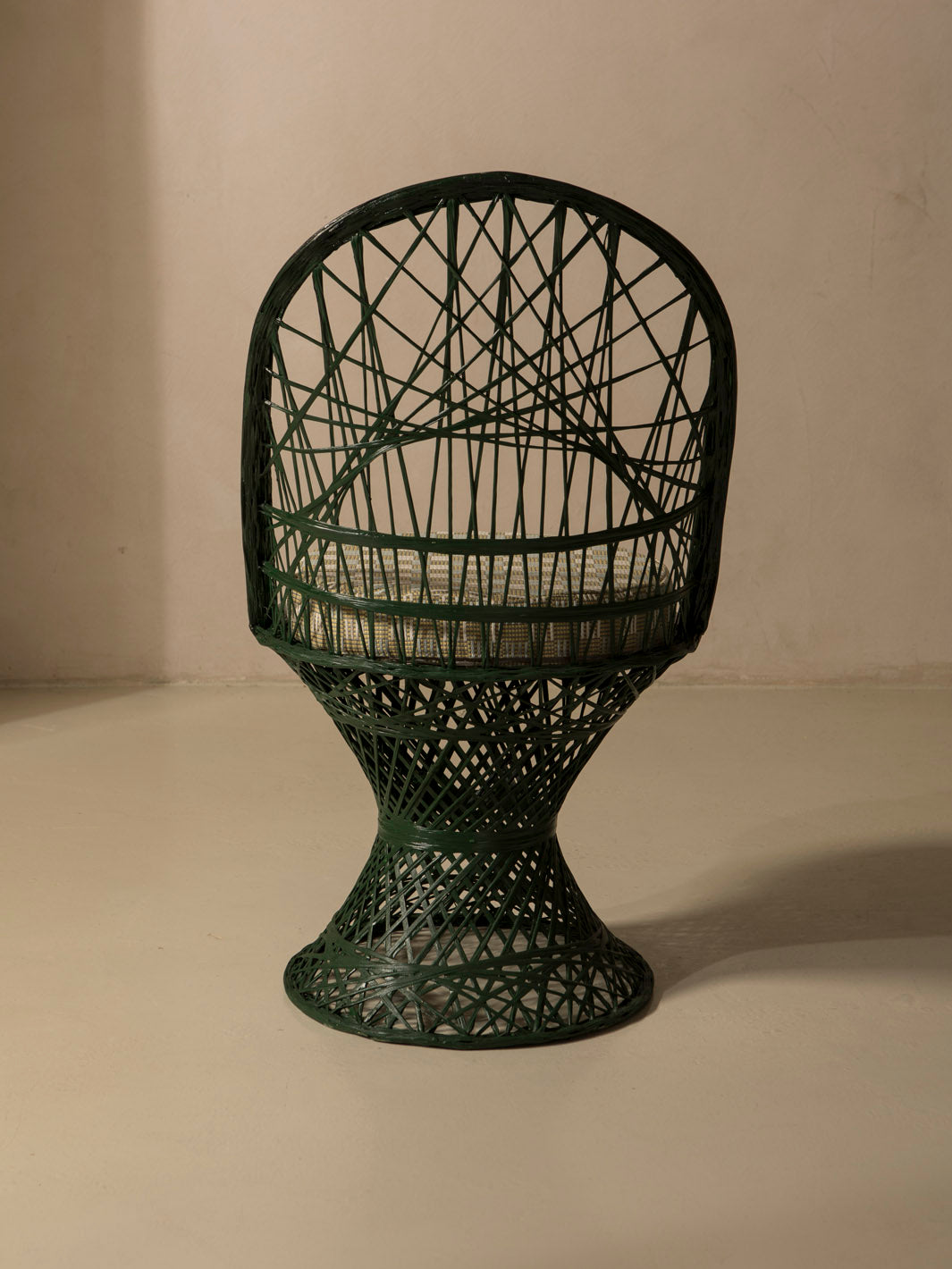 Dark green fiberglass dining chair