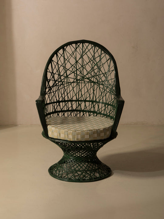 Dark green fiberglass armchair