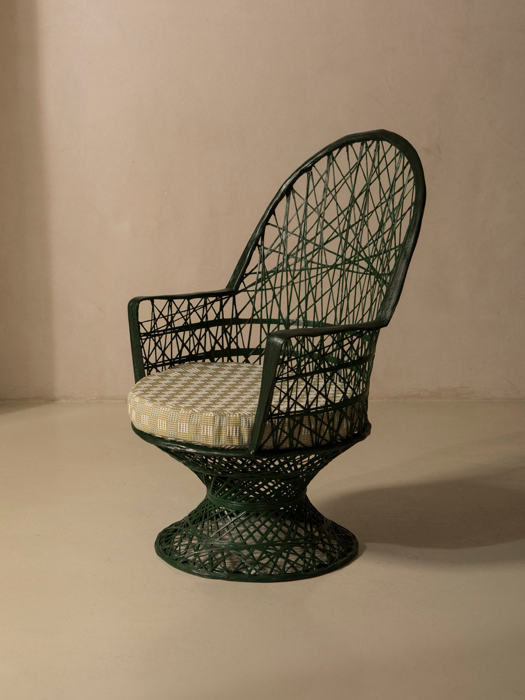 Dark green fiberglass armchair