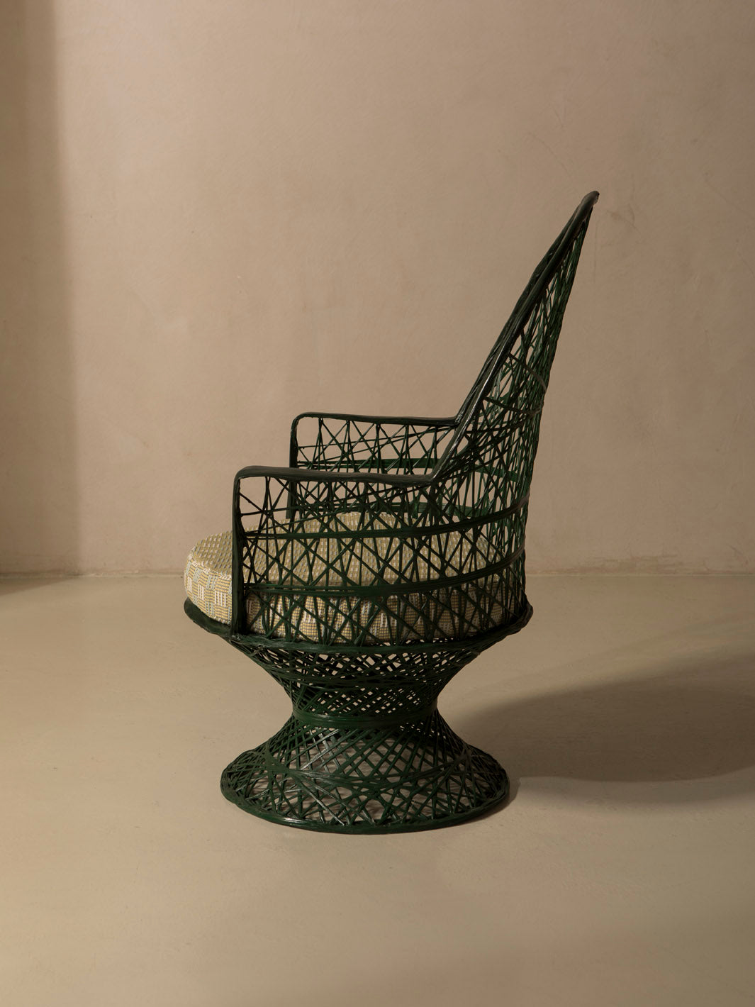 Dark green fiberglass armchair