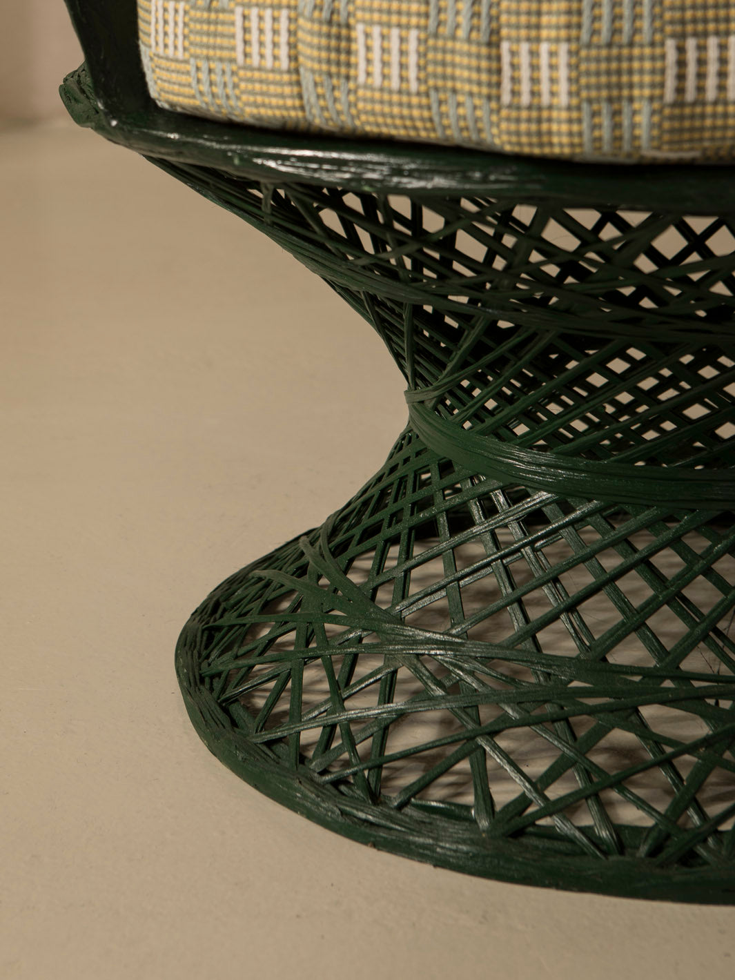 Dark green fiberglass armchair
