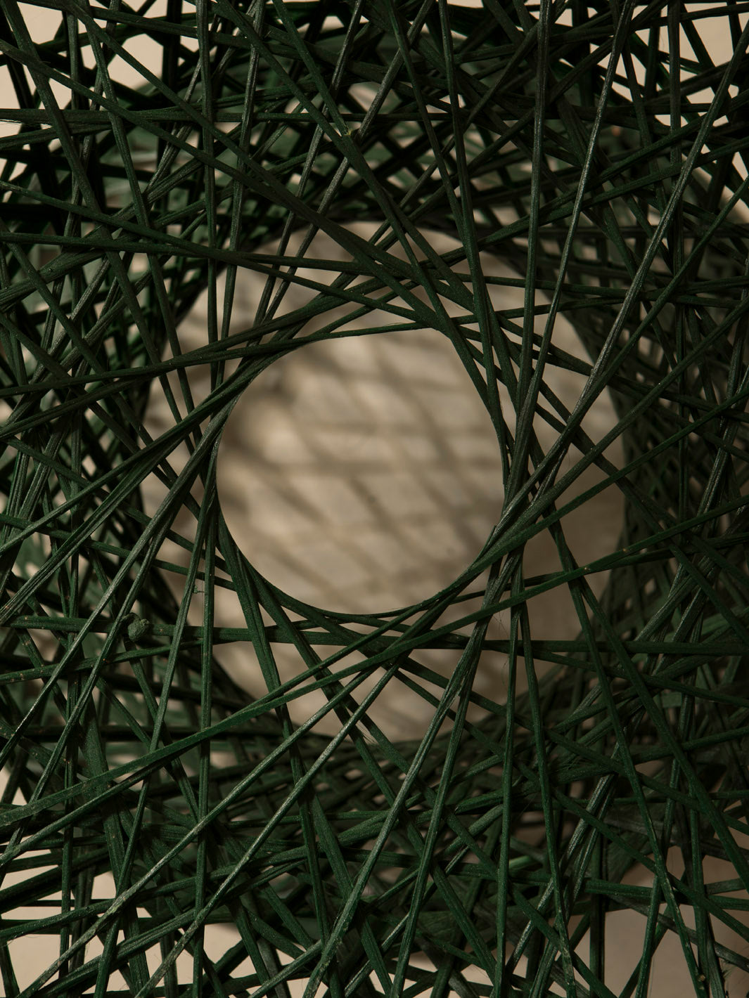 Dark green fiberglass armchair