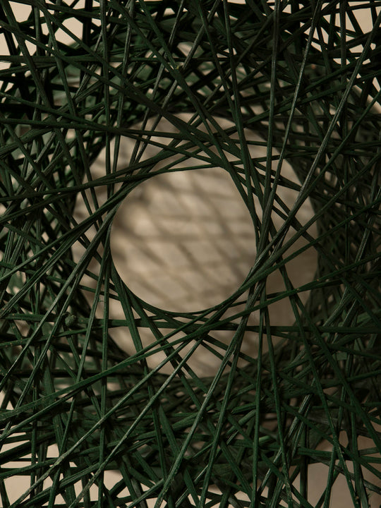 Dark green fiberglass dining chair